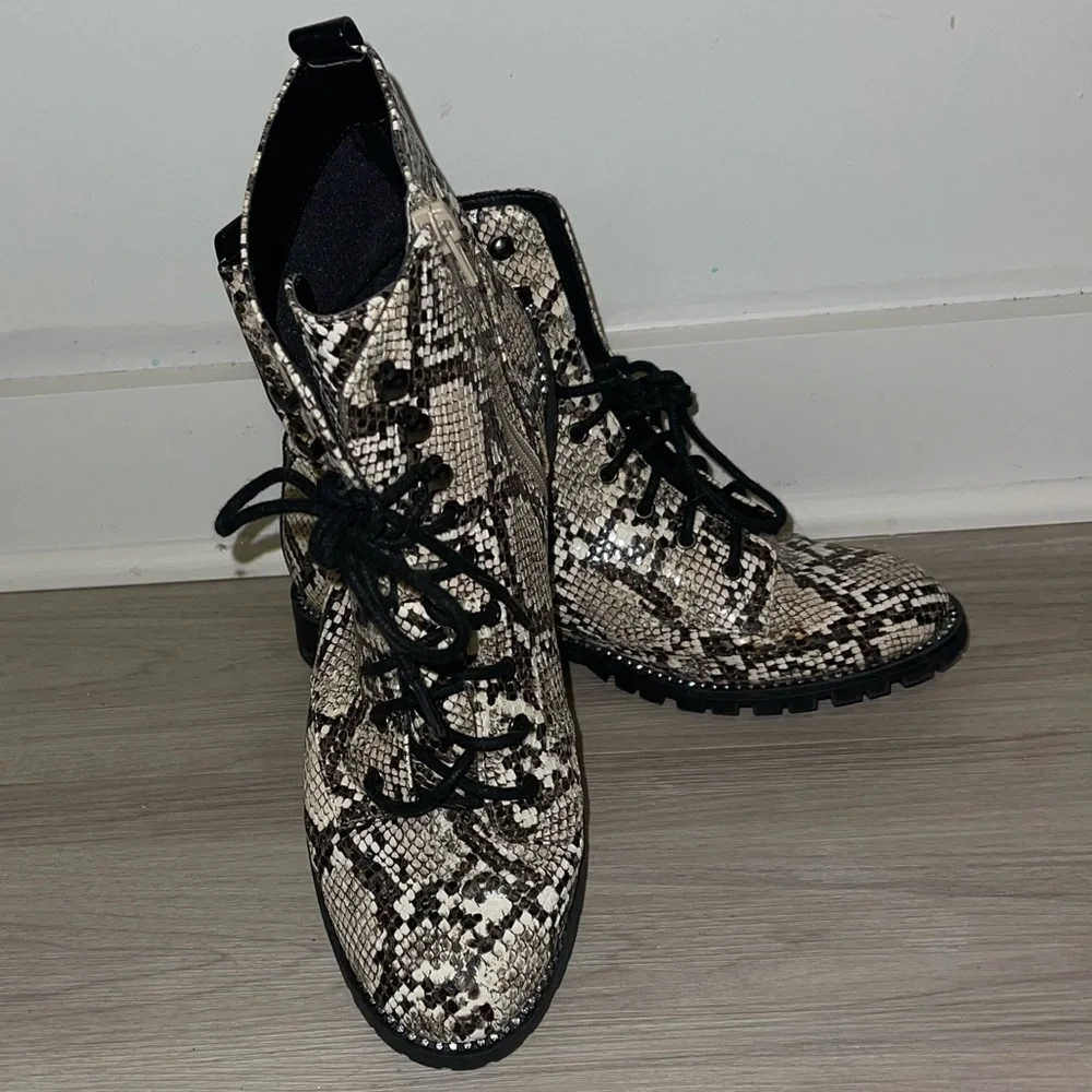 Express snakeskin combat booties. Rhinestone embellishing around sole. - Picture 3 of 10